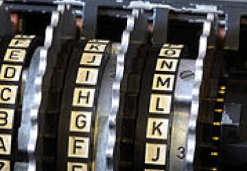 "Enigma rotors with alphabet rings" by TedColes - Own work. Licensed under CC0 via Wikimedia Commons - https://commons.wikimedia.org/wiki/File:Enigma_rotors_with_alphabet_rings.jpg#/media/File:Enigma_rotors_with_alphabet_rings.jpg